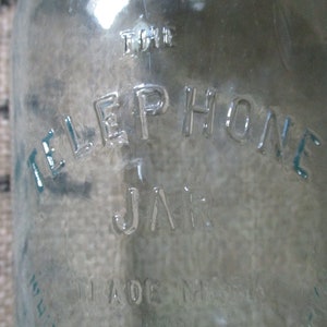 Quart Turquoise Canning Jar, Bail wire closure, Embossed &quot;Telephone Jar, Trade mark, Whitney Glass Works.&quot;