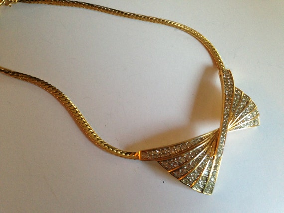 Designer Nina Ricci Pave set Rhinestone Bow Tie Design Necklace in Gold Tone Signed Nina Ricci
