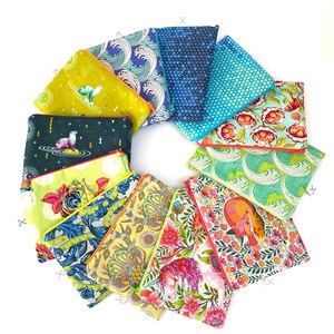 May include: A collection of 12 colorful zippered pouches with various patterns, including floral, geometric, and animal prints. The pouches are arranged in a circle on a white background.