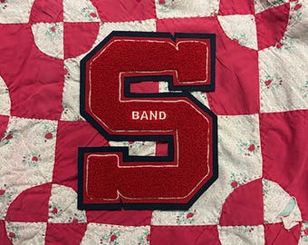 Giant felt and chenille letter S applique with "BAND" embroidery