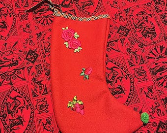 Handmade red wool stocking with rose appliquesa and red plaid trim