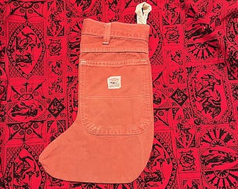 Hanmade holiday Christmas stocking made from rosy red Pointer jeans with pockets and logo
