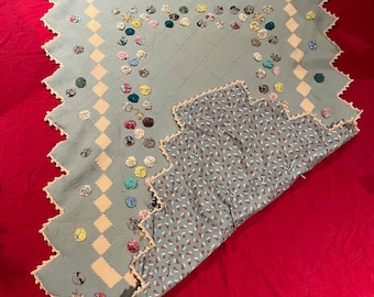 SALE Vintage baby blue and cream crochet blanket appliqued with cotton yo-yos and lined with hedgehog print cotton