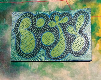 Green and blue BOOTY painting on found wood