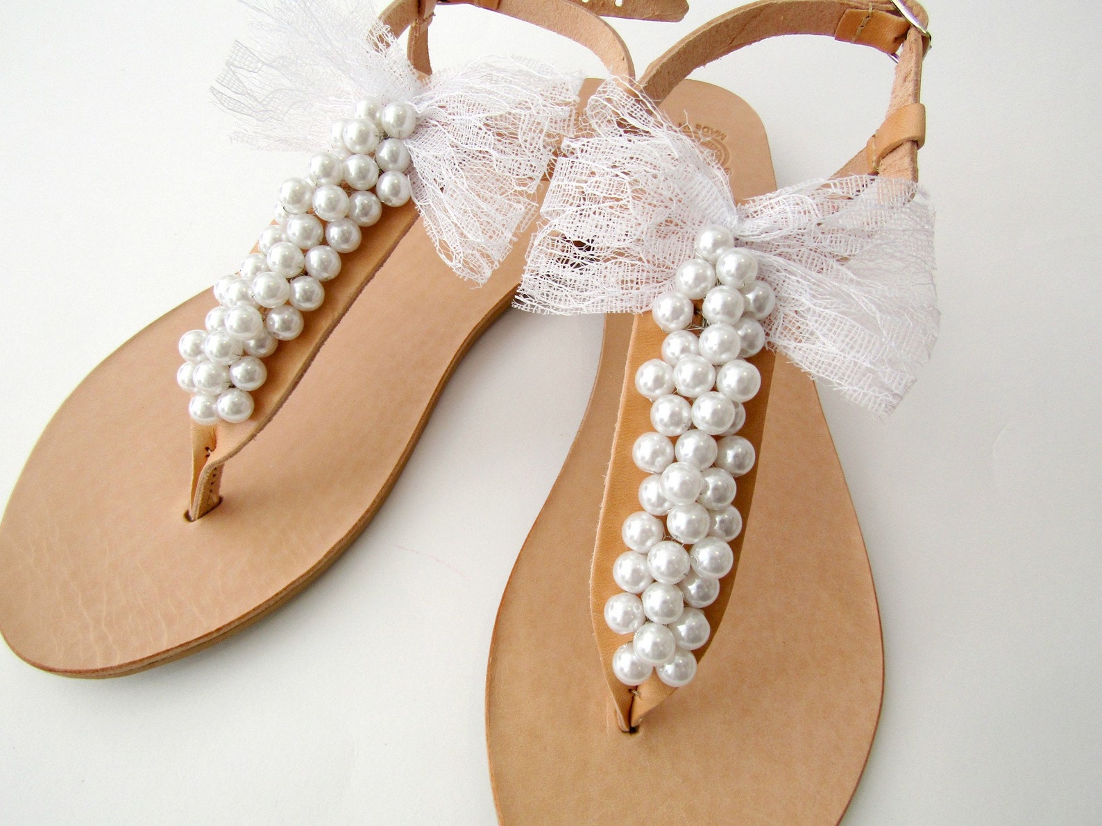 tan sandals with pearls
