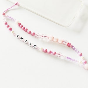 Pink phone strap, Phone beaded bracelet, Phone jewelry, Trendy phone wrist strap, Smile phone strap, Beaded pink phone string, Gift for her