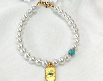 Βραχιόλι με πέρλες και επίχρυσο μάτι  /  Pearl beaded evil eye bracelet