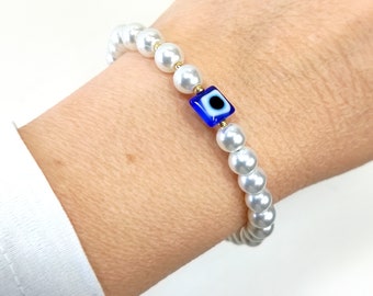 Βραχιόλι με πέρλες και μπλε ματάκι    /    Evil eye pearl beaded bracelet