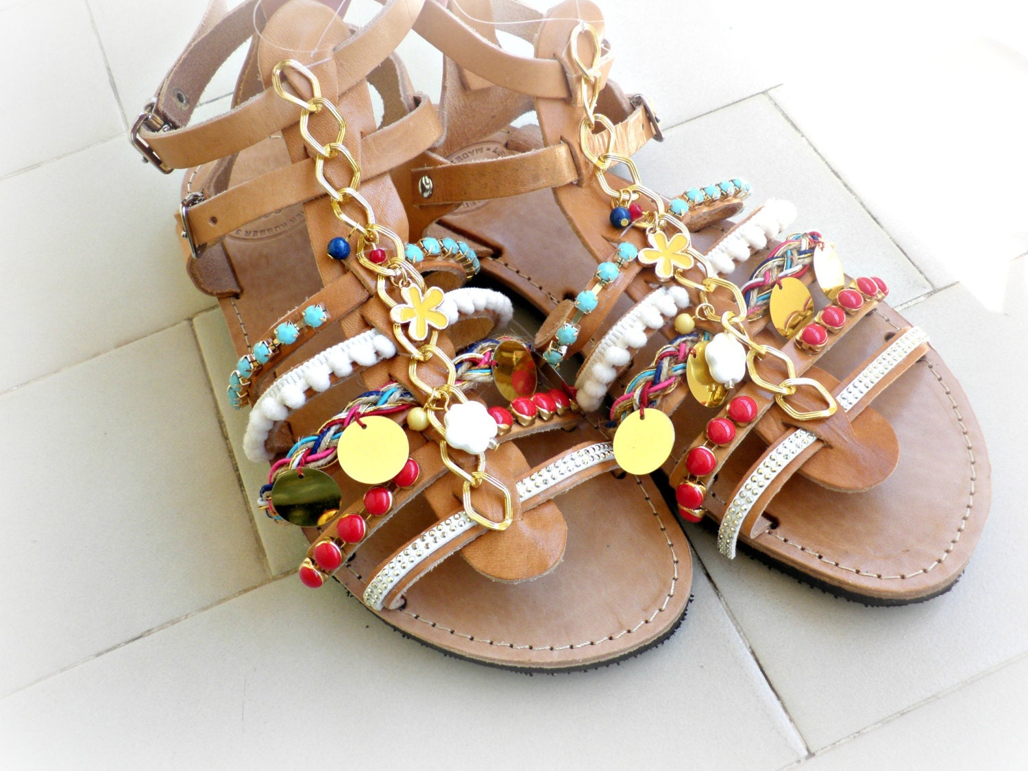 Introducir 111+ imagen greek pom pom shoes Abzlocal.mx