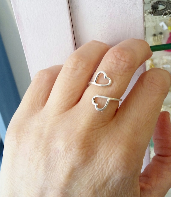 Silver ring with two hearts deals