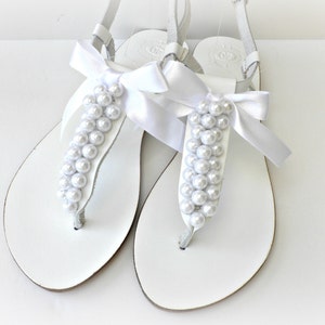 White wedding sandals with white pearls and bow, Pearl sandals, Beach wedding shoes, Bridal shoes, Bridesmaid flats, Bridal party shoes