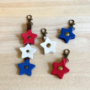3 Stars Flair and 3 Zipper Pulls- Poppy Red, Pearl, Astro Blue Portland Leather Goods Zipper Pull Keychain