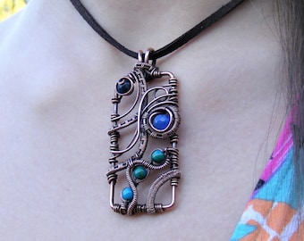 Wire wrapped chaos pendant with sea blue jade, apatite and chrysocolla beads