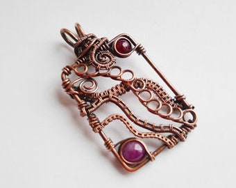 Wire wrapped copper chaos pendant with Burmese rubies