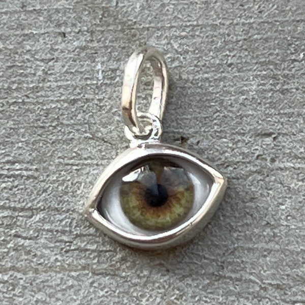 Mini dark hazel eye pendant in the updated Sterling Silver setting