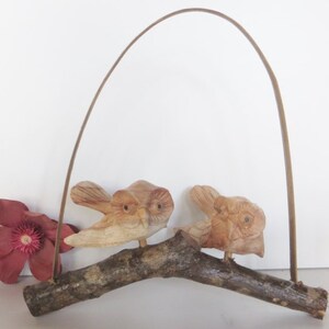 Two OWLS on a branch. Hand carved , hangs or stands
