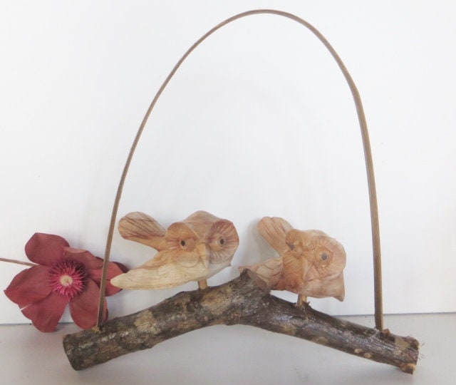 Two OWLS on a branch. Hand carved , hangs or stands