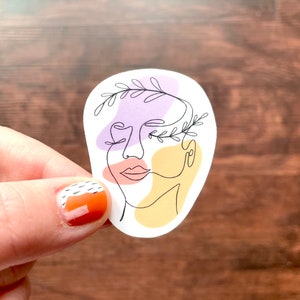 Adesivo per il disegno del viso di una riga / Belle donne