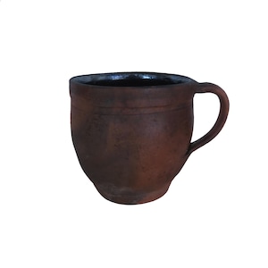 May include: A brown ceramic mug with a rounded body and a handle. The mug has a dark brown glaze and a slightly textured surface.