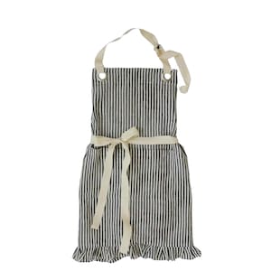 A black and white striped apron with a white ribbon tied around the waist.