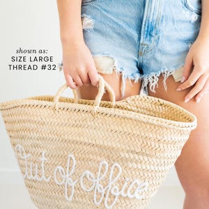 Handwoven straw beach bag with fun saying