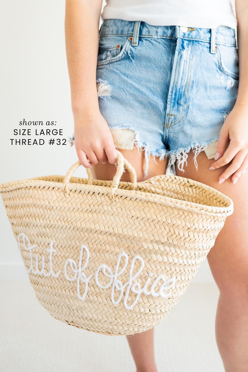 Handwoven straw beach bag with fun saying