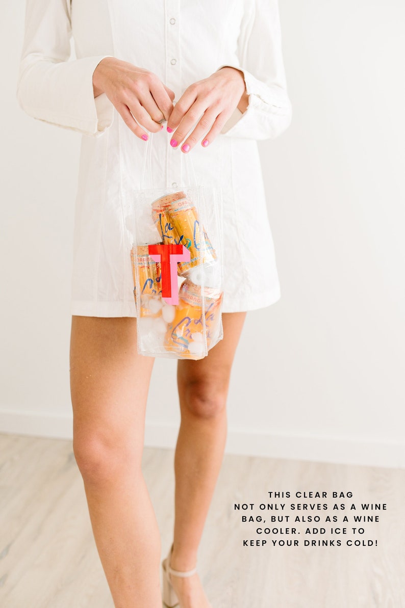 Transparent wine tote with red monogram and canned drinks