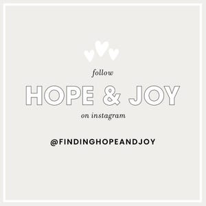 May include: White hearts with the text "follow HOPE & JOY on instagram @FINDINGHOPEANDJOY"