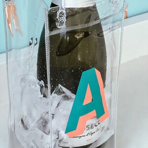 Monogrammed transparent wine bag with handles and ice inside