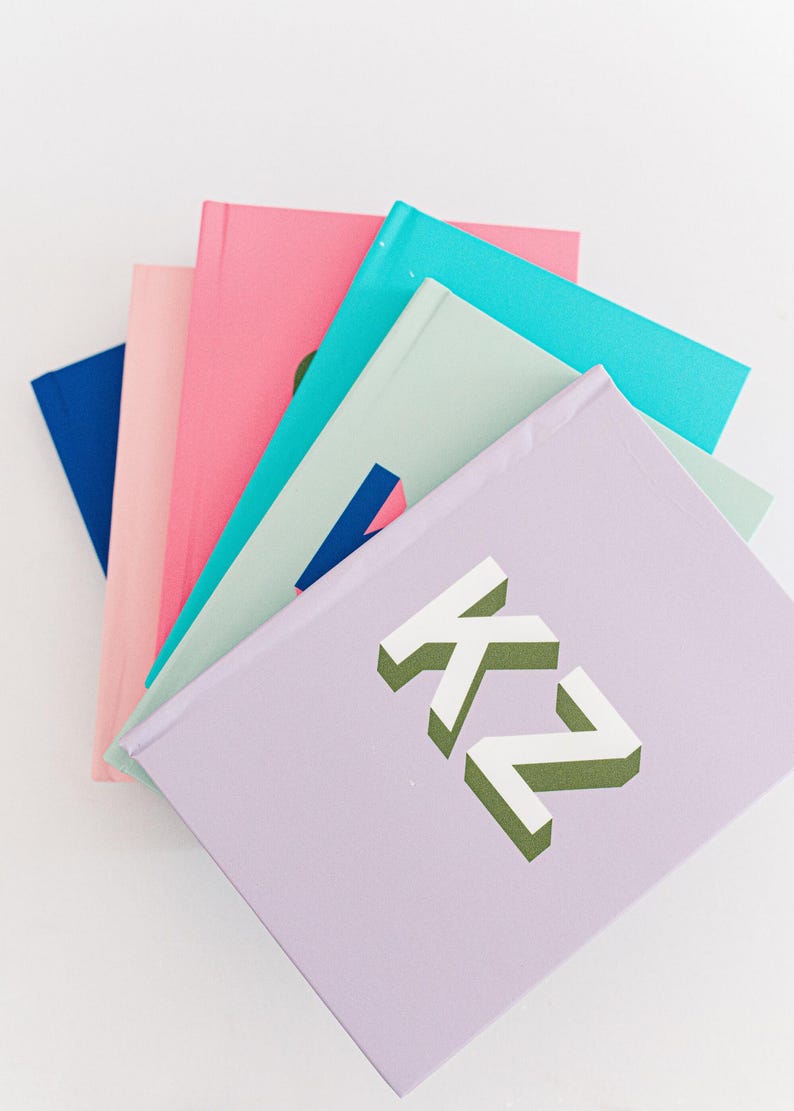 Hardcover lined journal with monogram
Custom initial notebook gift