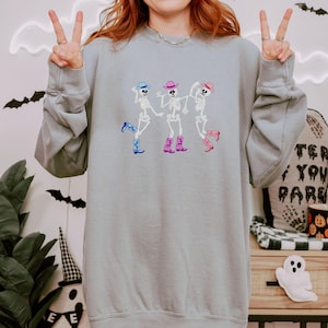Dancing Skeletons Embroidered Sweatshirt - Western Halloween Crewneck - Cowboy Skeleton Fall Shirt - Spooky Season Cozy Pullover
