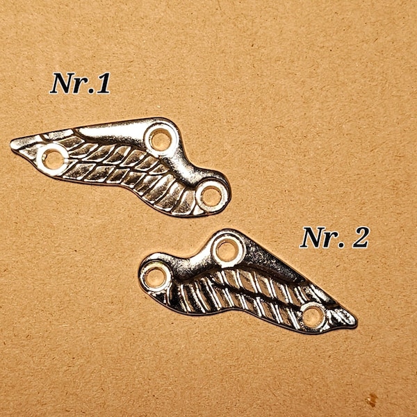 Vogelschwinge,  Flügel, Zierniete, Aufnieter, rechts und links