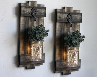 Large farmhouse mason jar hanging sconces with flowers & lights. Rustic wood wall candle holders or planters