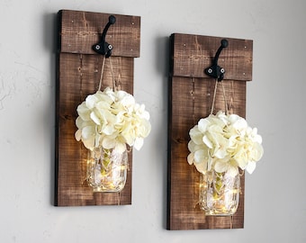 Rustic mason jar wall sconce set with flowers. Wooden wall plaque with hooks & greenery. Shutter wall decor