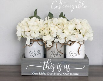 This is Us mason jar floral centerpiece for table in wooden planter box. Farmhouse home decor & newlywed gifts. Personalized centerpiece