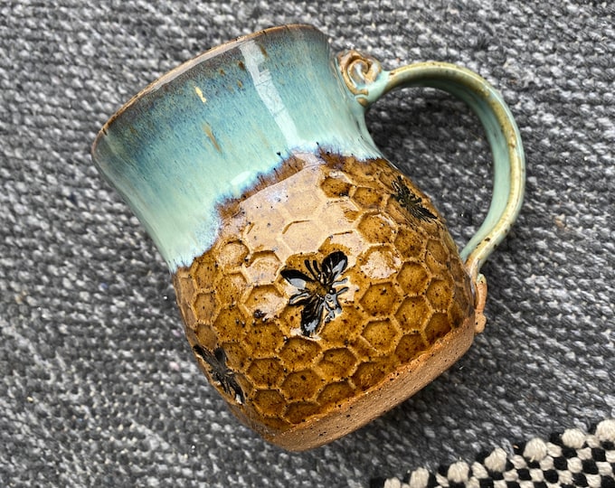 Handmade Bee Pottery Mug: Honeycomb Design, Sea Foam Blue Rim