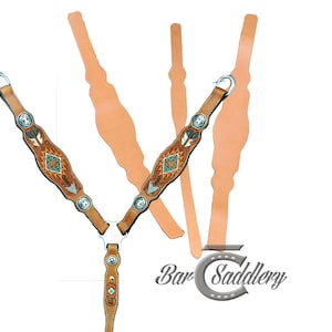 May include: A tan leather horse breast collar featuring intricate geometric tooling with turquoise and brown accents, silver-toned hardware, and decorative conchos. The text Bar Saddlery is displayed in a stylized font near the bottom right corner.