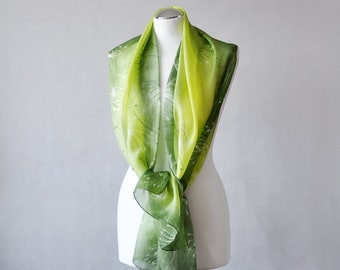 Hand Painted Long Silk Scarf in graphic pattern.Scarf in shades of green color with white and dark green floral pattern