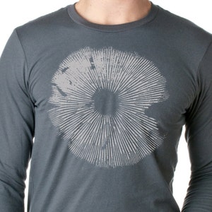 May include: A dark grey long-sleeved shirt with a white mushroom graphic.