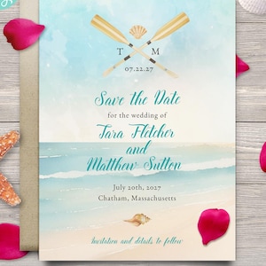 May include: A beach-themed wedding invitation with a watercolor design. The invitation features crossed oars, a seashell, and the text "Save the Date" with the names Tara Fletcher and Matthew Sutton, and the date July 20th, 2027.