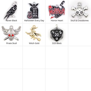 May include: A collection of seven metal charms including a black raven, a tombstone with text reading Halloween Every Day, a heart with a knife and the word Horror, a skull and crossbones, a pirate skull, a gold witch, and a black D20 die.