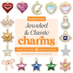 May include: A collection of metal charms for pet collars, including shapes like hearts, stars, a moon, a crown, a sun, a bow, an eye, and a pearl. The central text reads MADE BY CLEO Jeweled & Classic charms OVER 50 STYLES FOR PET COLLARS.