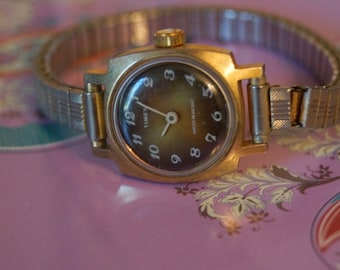 Vintage Timex Ladies Watch with a Stretch Band