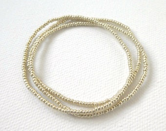 Set of 3 elastic stretchy soft gold beaded bracelets