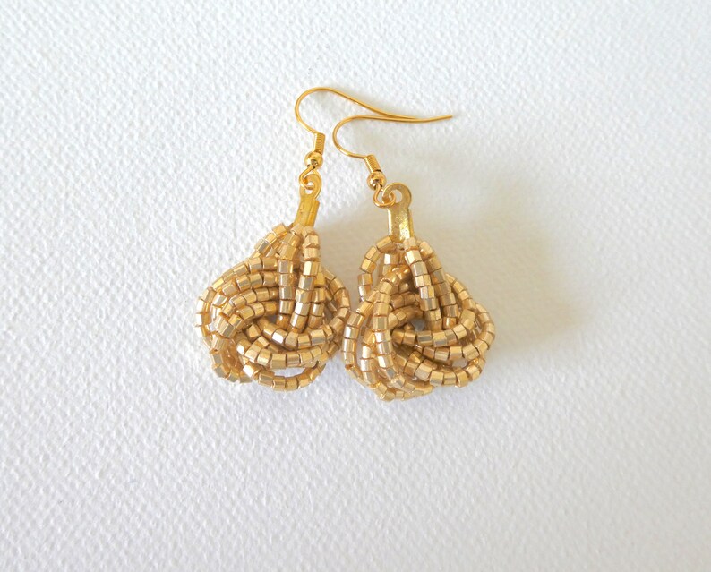 Light gold beaded earrings gold knotselegant earringsbeaded Etsy