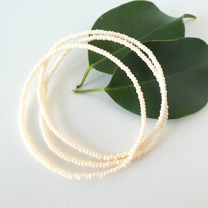 Ivory bracelets, cream stretch bracelets, stacking beaded bracelets, bridesmaids gifts, flower girl bracelet, elastic bracelet, boho, dainty