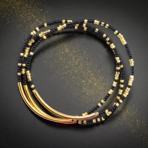 Gold and black bracelets , bridesmaid gifts , stretchy bracelets , gold bar bracelets