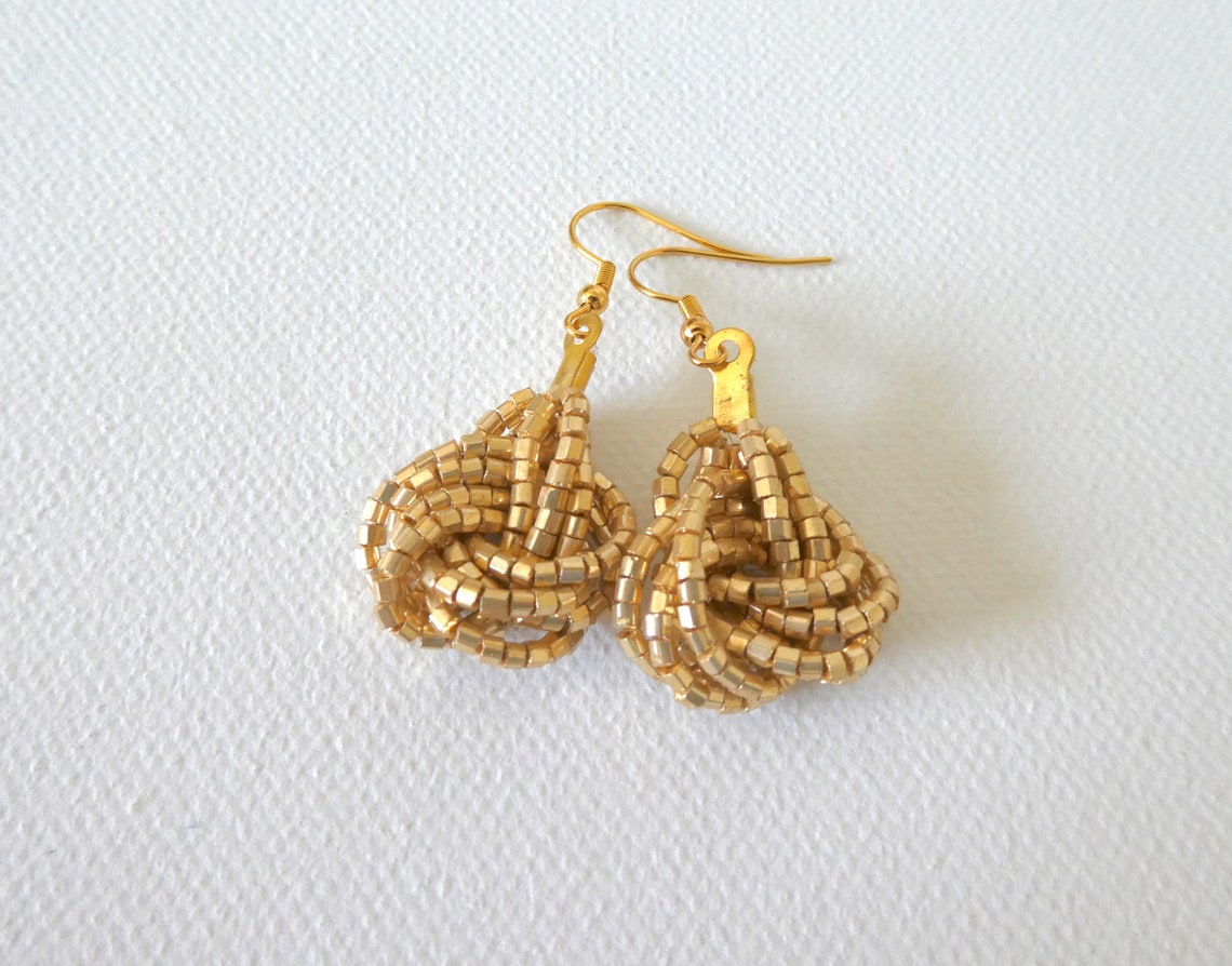 Light gold beaded earrings gold knotselegant earringsbeaded Etsy