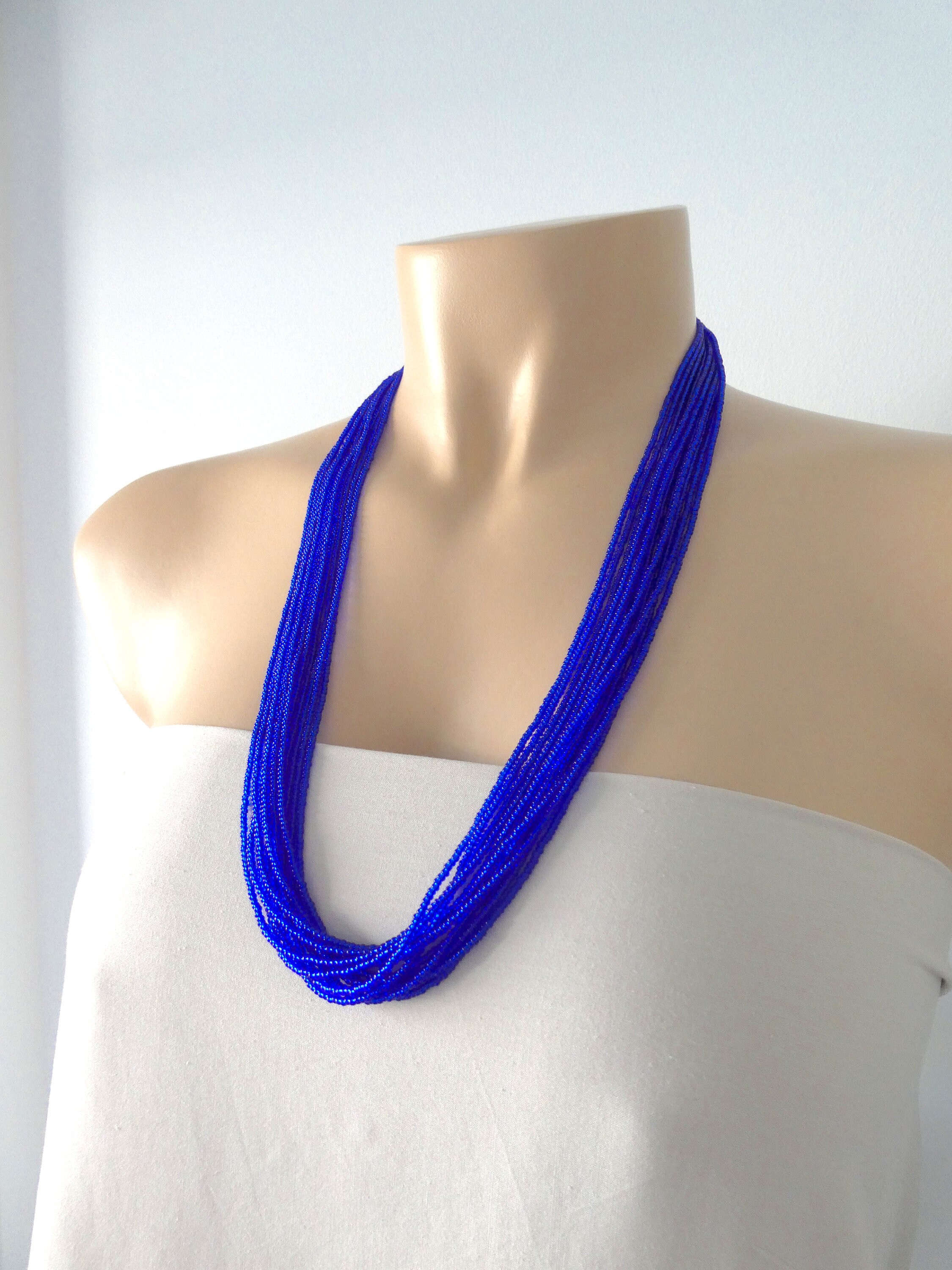 Amazon.com: Gold Cobalt Blue Necklace with Majestic Blue Crystal Pendant  Wire Wrapped Yellow or Rose Gold Filled : Handmade Products