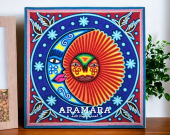 メキシコのアート。ウイチョル族の糸で描いた絵画。メキシコの